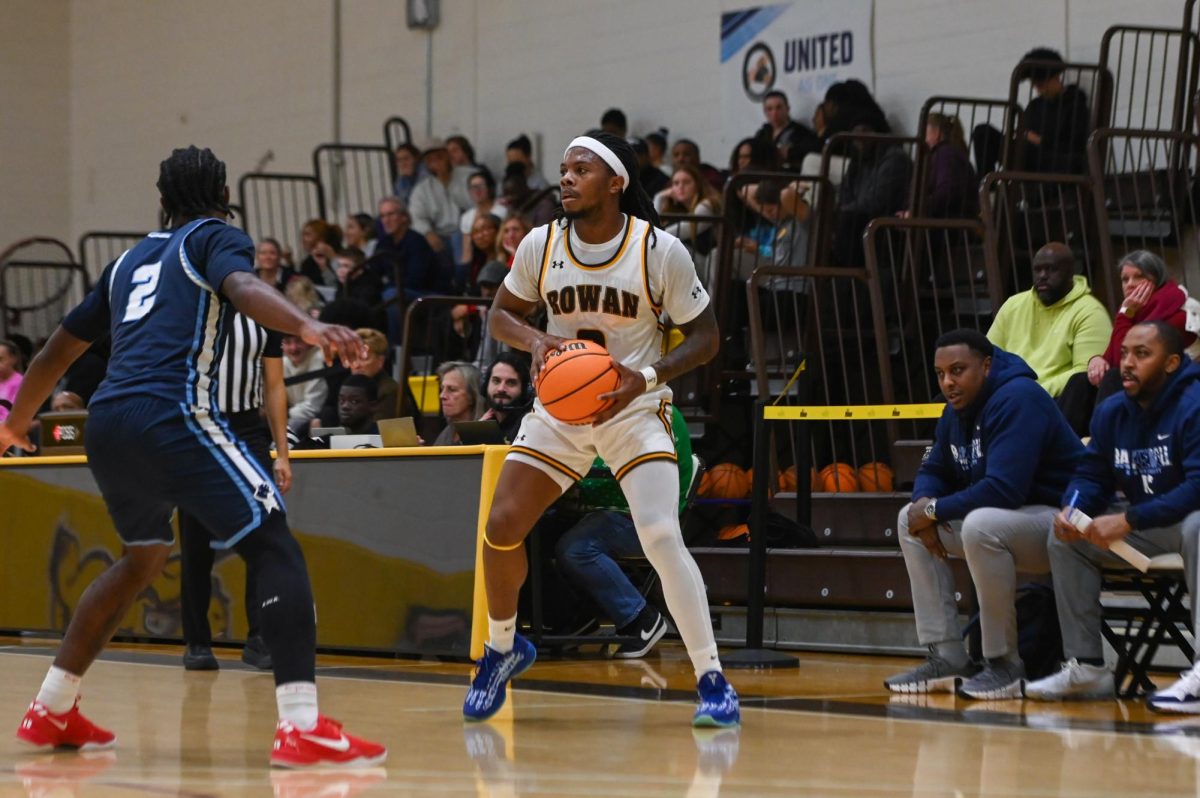 Taz Cantey looks to pass the basketball. Cantey scored a season-high 25 points against Rutgers-Newark. (Sports Photographer / Trevor Miceli)