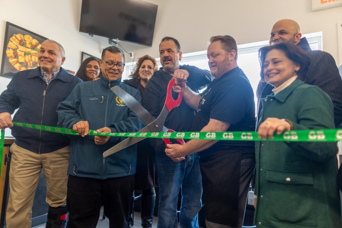 Ryan McMullen and Howard Ellis preparing to cut the ribbon to launch their new venture. Saturday, Jan. 24, 2026. Glassboro, N.J. (Contributor / Joe Capuyan)