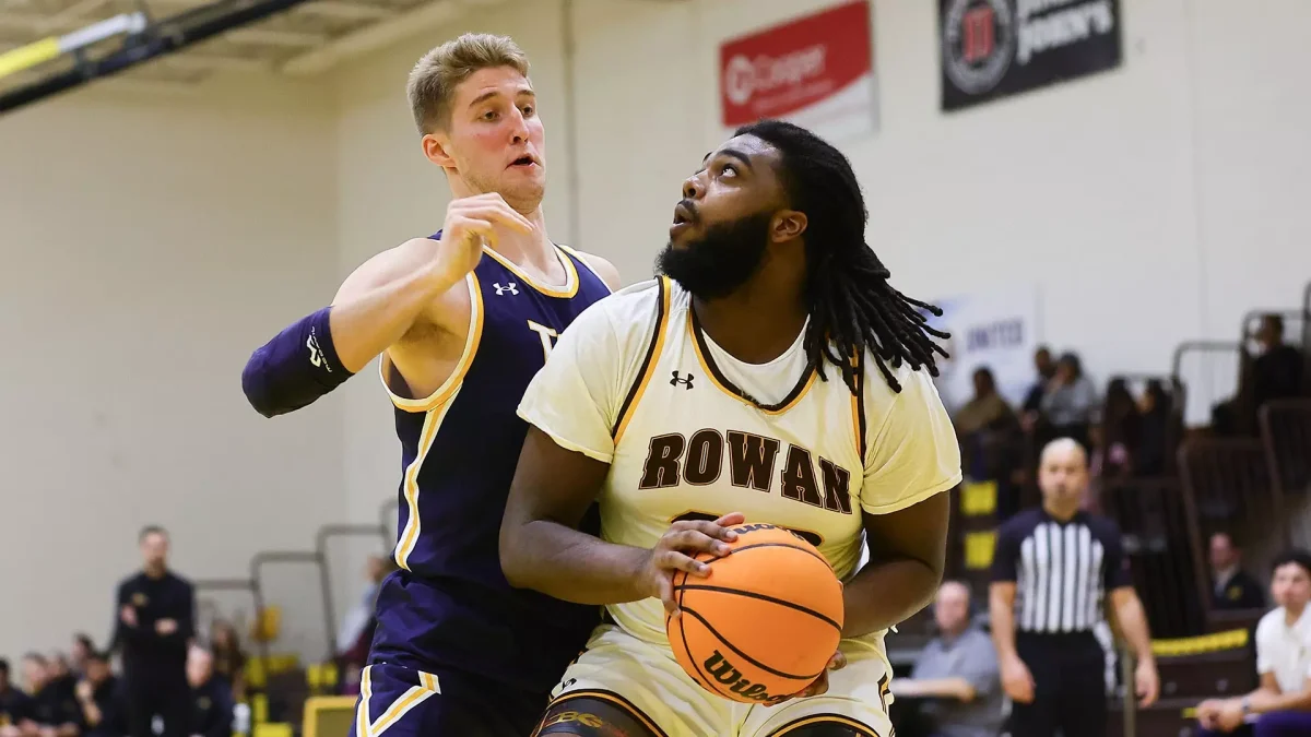 Khalil Baker drives to the basket. (Rowan Athletics)
