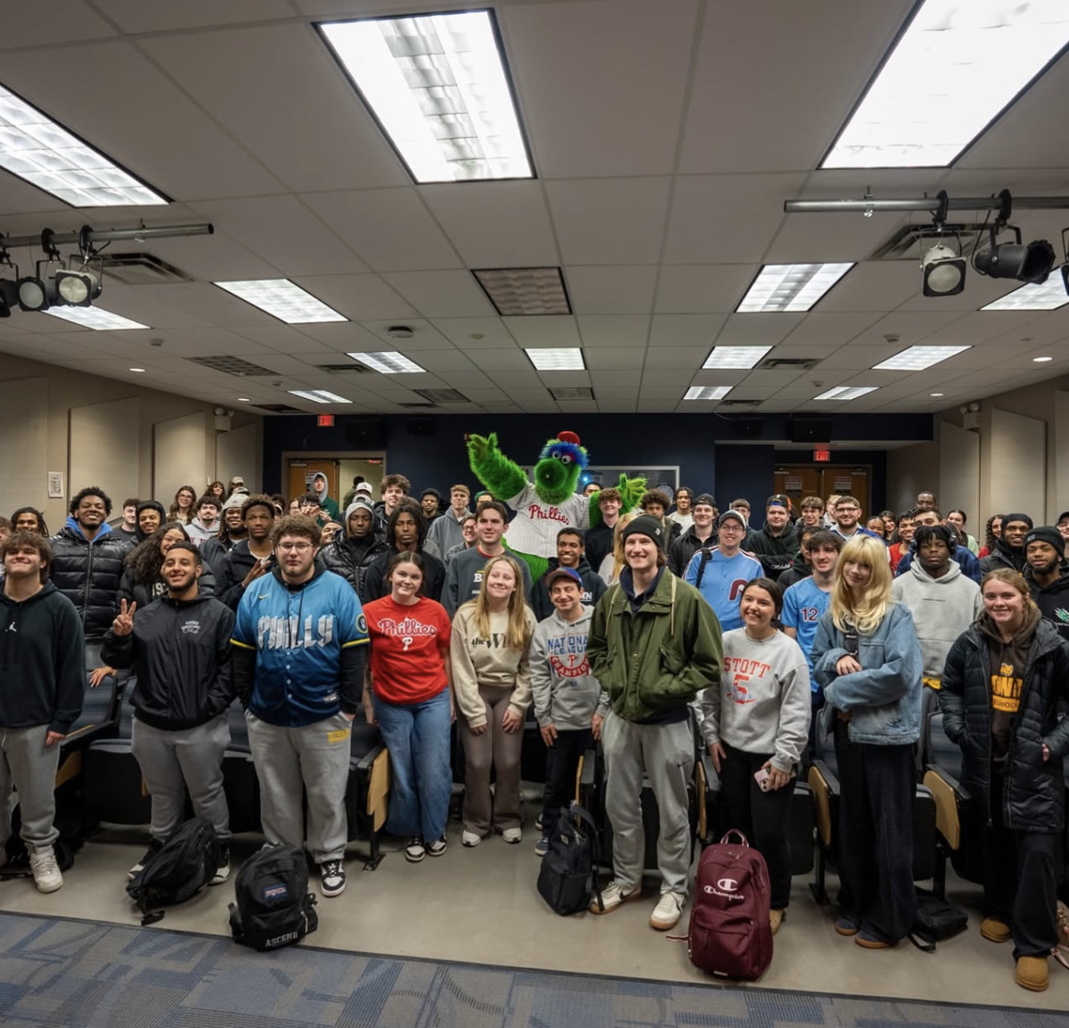 The Phillie Phanatic poses for a picture with students at Pizza with the Pros. Glassboro, N.J. Monday, Feb. 9, 2026. (Rowan University)