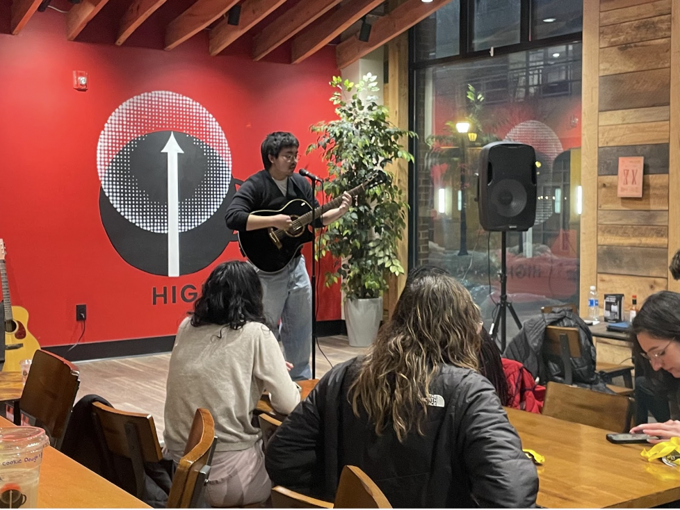 Donny Nguyen, 18, performing an original song in front of an audience. February 12th, 2026. (Staff Photographer / Melanie Barahona)