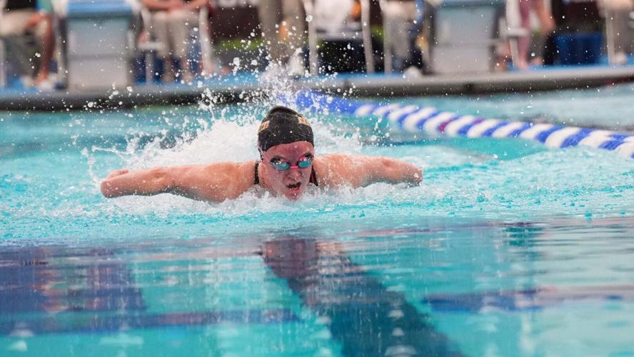 Ella Pennington swims the butterfly. (Rowan Athletics)