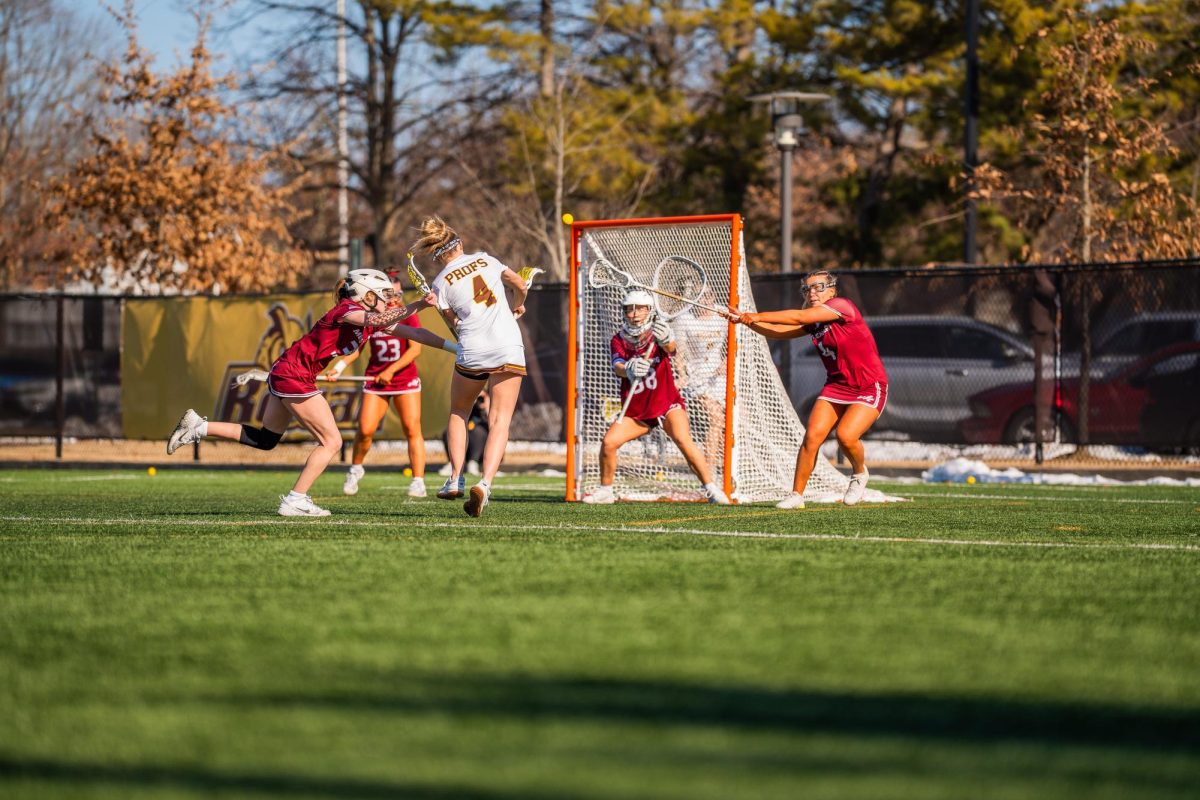 Alexis Lowry takes a shot on goal. (Sports Photographer / Shelby Kauffman)