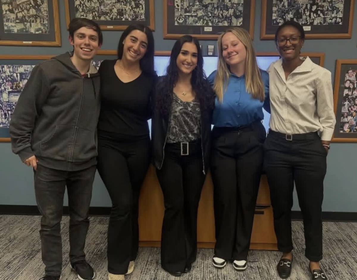 Jacob Michaud, Sydney Cella, Marchella Mazzoni, Sarah Shockey, and Leah Thorpe pose for a picture on Election night (Mason Kinnahan)