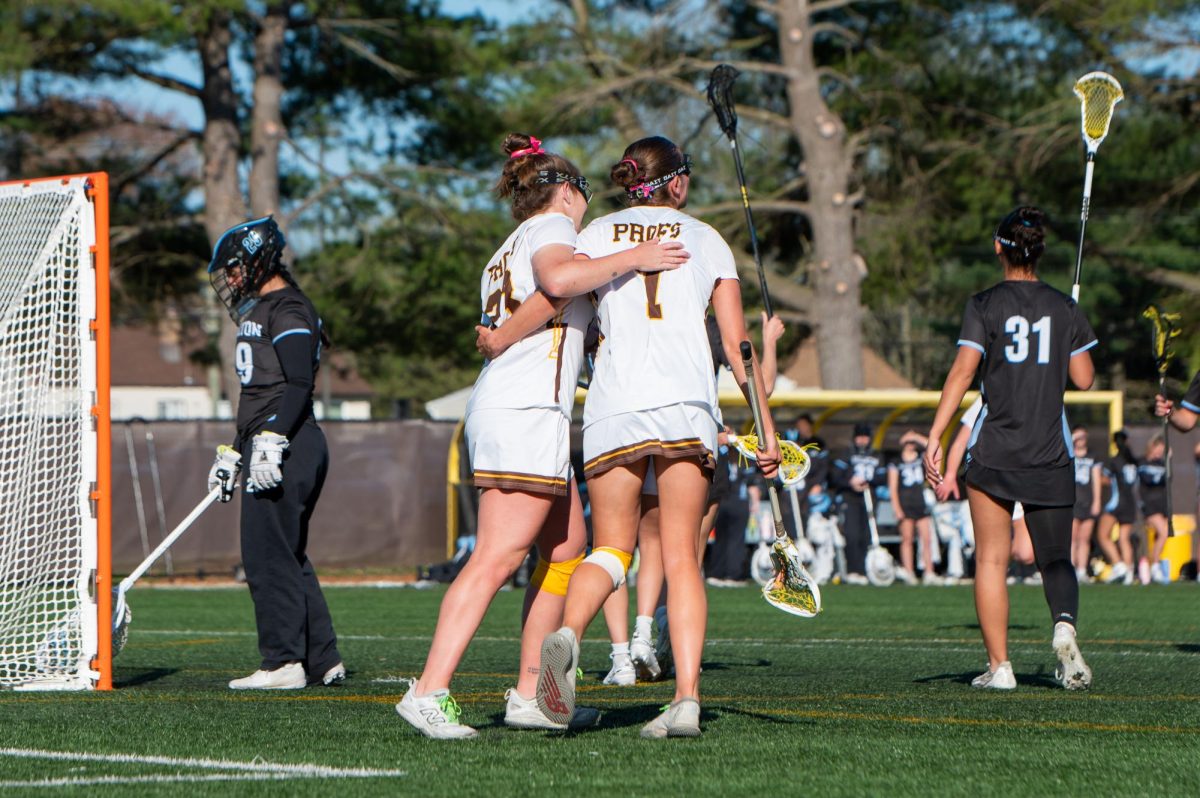 Elaina Corson (left) and Trish Gillen (right) celebrate a goal. Glassboro, N.J. Wednesday, April 8, 2026. (Sports Photographer / Trevor Miceli)
