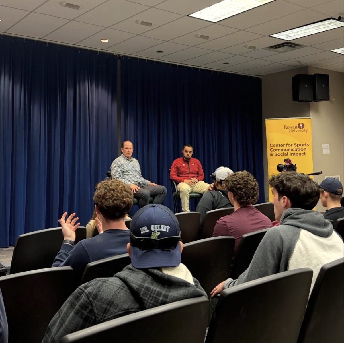Mohammed Hassanin talks to the crowd of students inside King Auditorium. (@rowansportscam on Instagram)