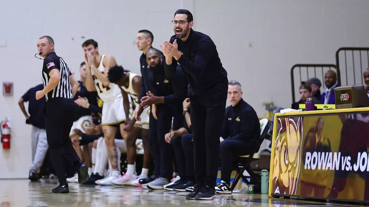 Eric Brennan on the sidelines. (Rowan Athletics)