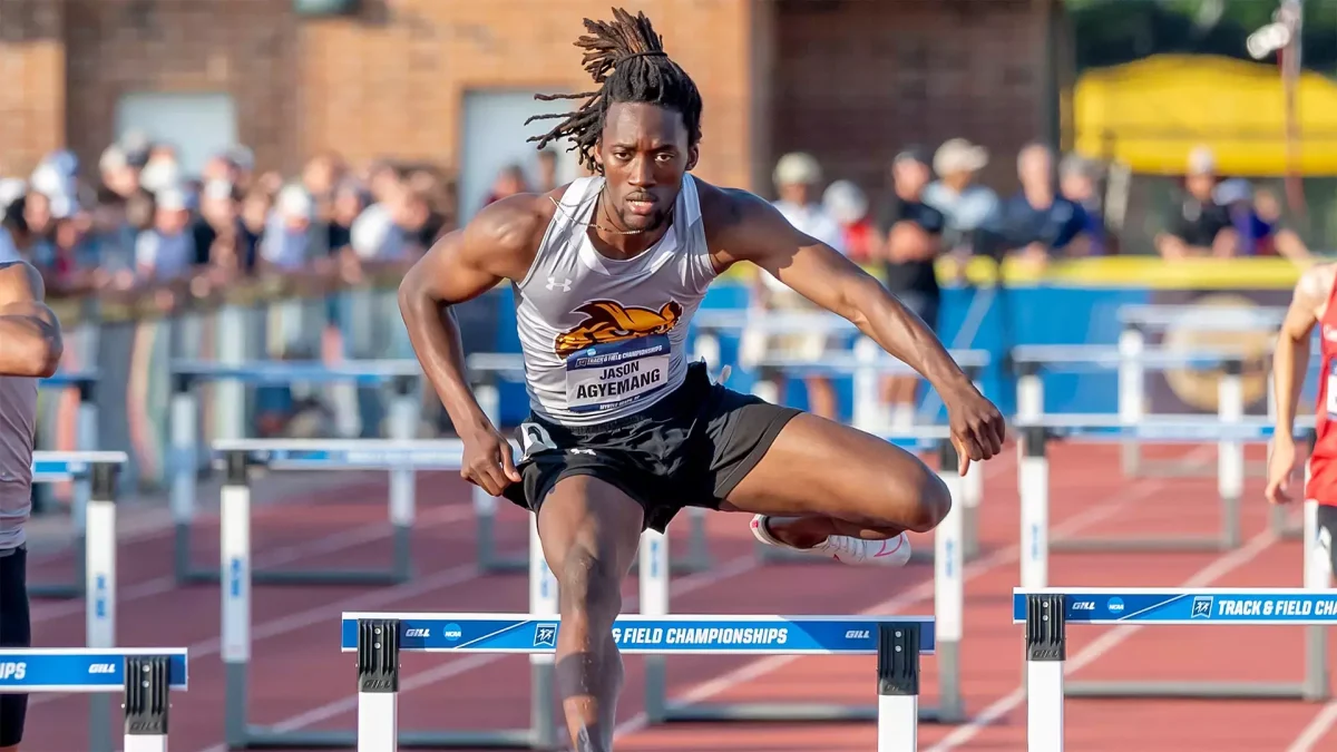 Jason Agyemang competes in the hurdles. (Rowan Athletics)