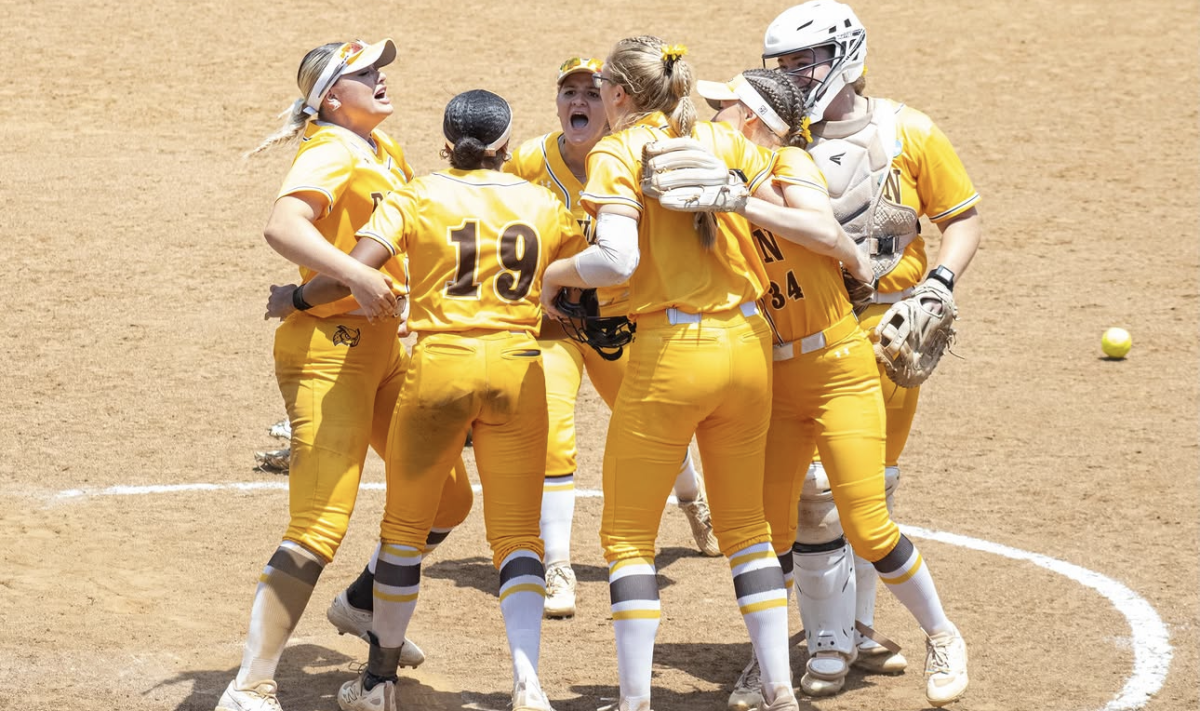 The Profs celebrate in the circle with Emily McCutcheon after taking down the undefeated Virginia Wesleyan Marlins. Salem, Va. Thursday, May 28, 2026. (Photographer Editor / Melanie Barahona)