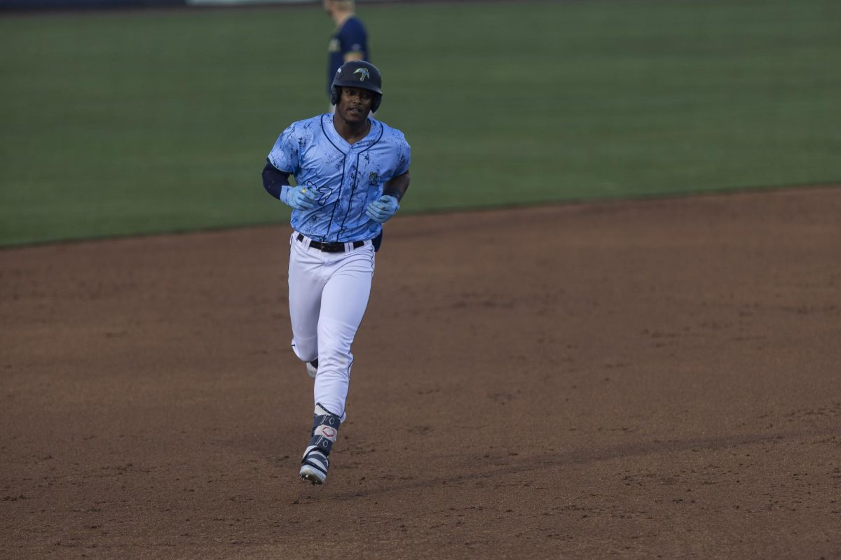 Elijah Green rounds the bases. (Photographer / Ryan Griffith)