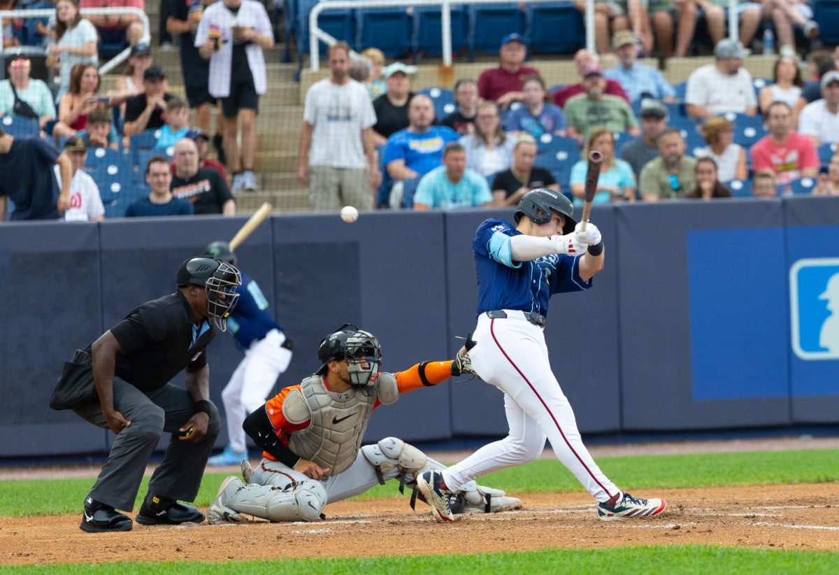 Eli Willits swings the bat. (Lydia FitzGerald)