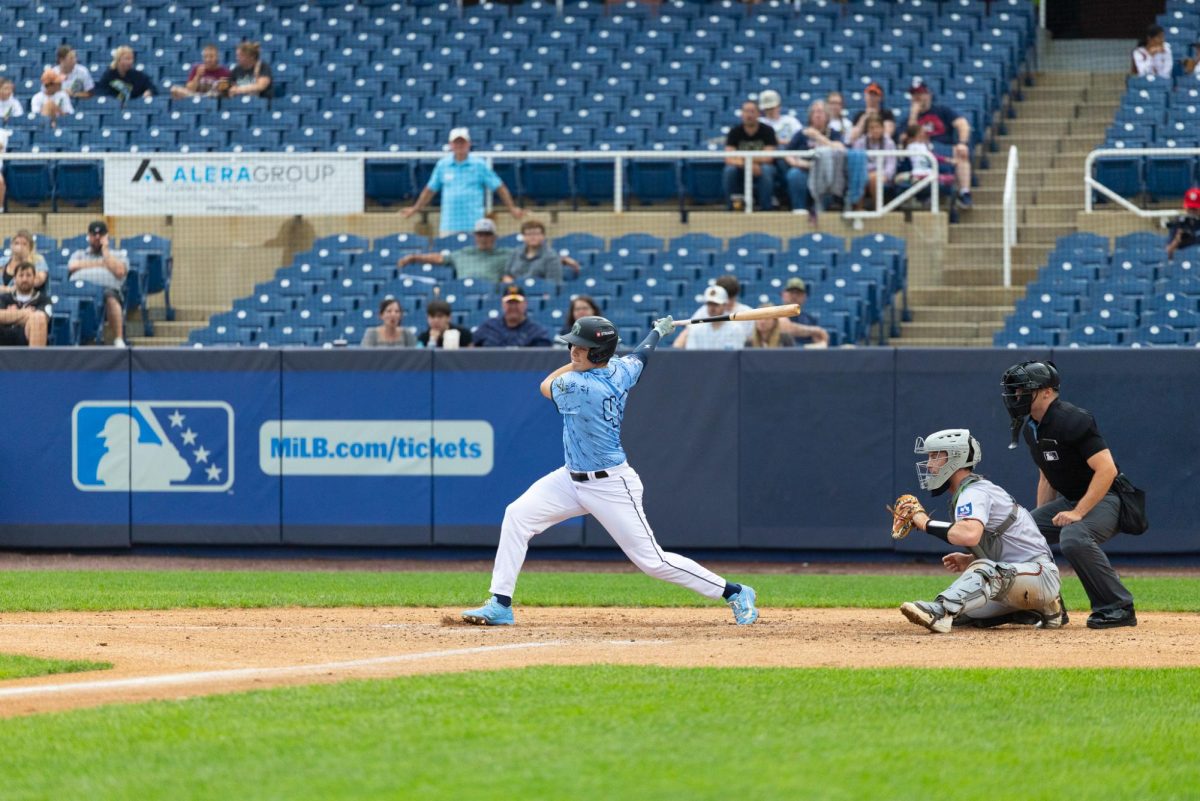 Jack Moroknek swings through a pitch. (Lydia FitzGerald)
